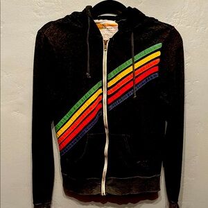 This is a used aviator nation sweatshirt slightly faded in good condition